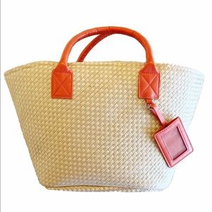 New straw tote with orange handles